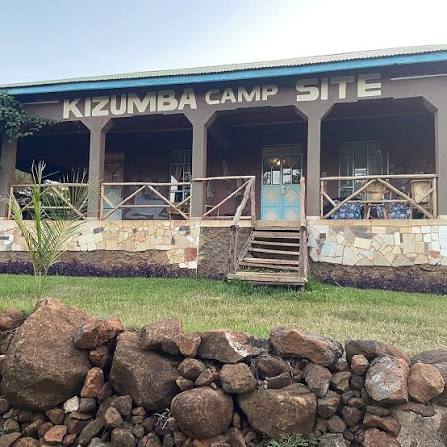Comfortable dome tents and camping gear set up for a group Joining budget safari